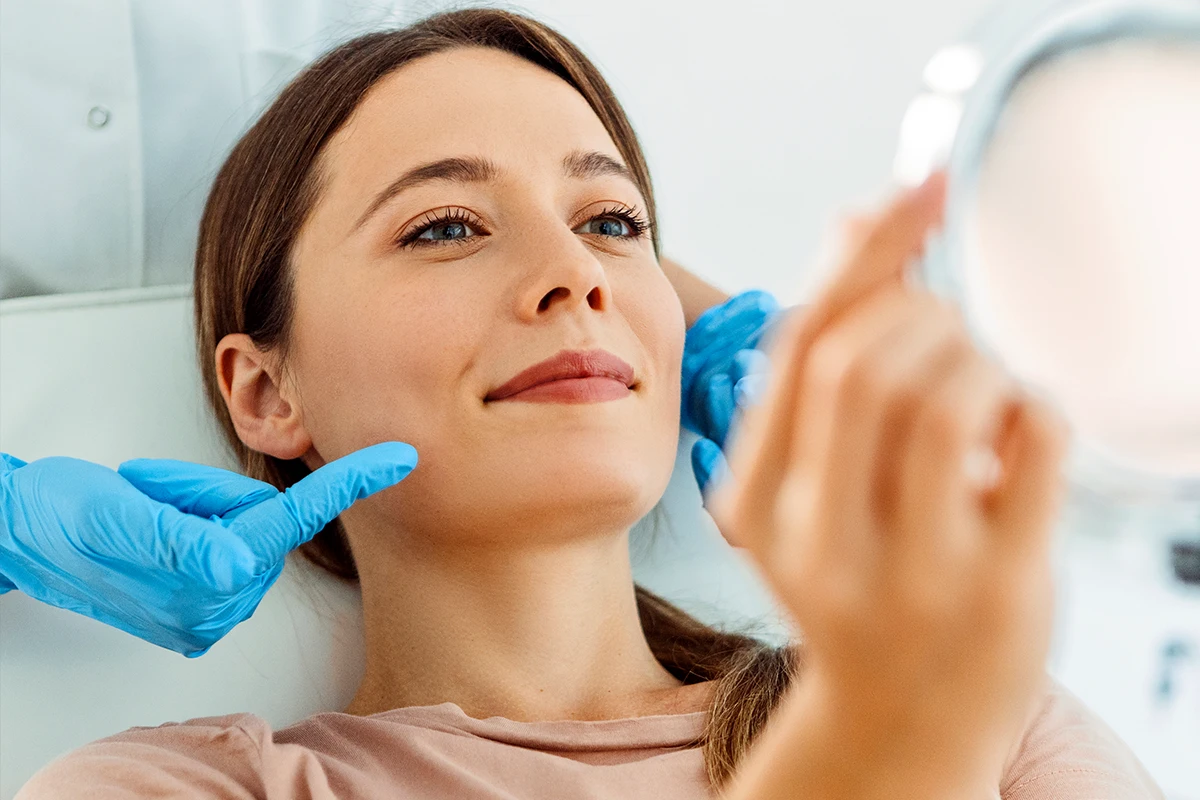 Buccal fat removal consultation evaluating cheek contour and facial balance